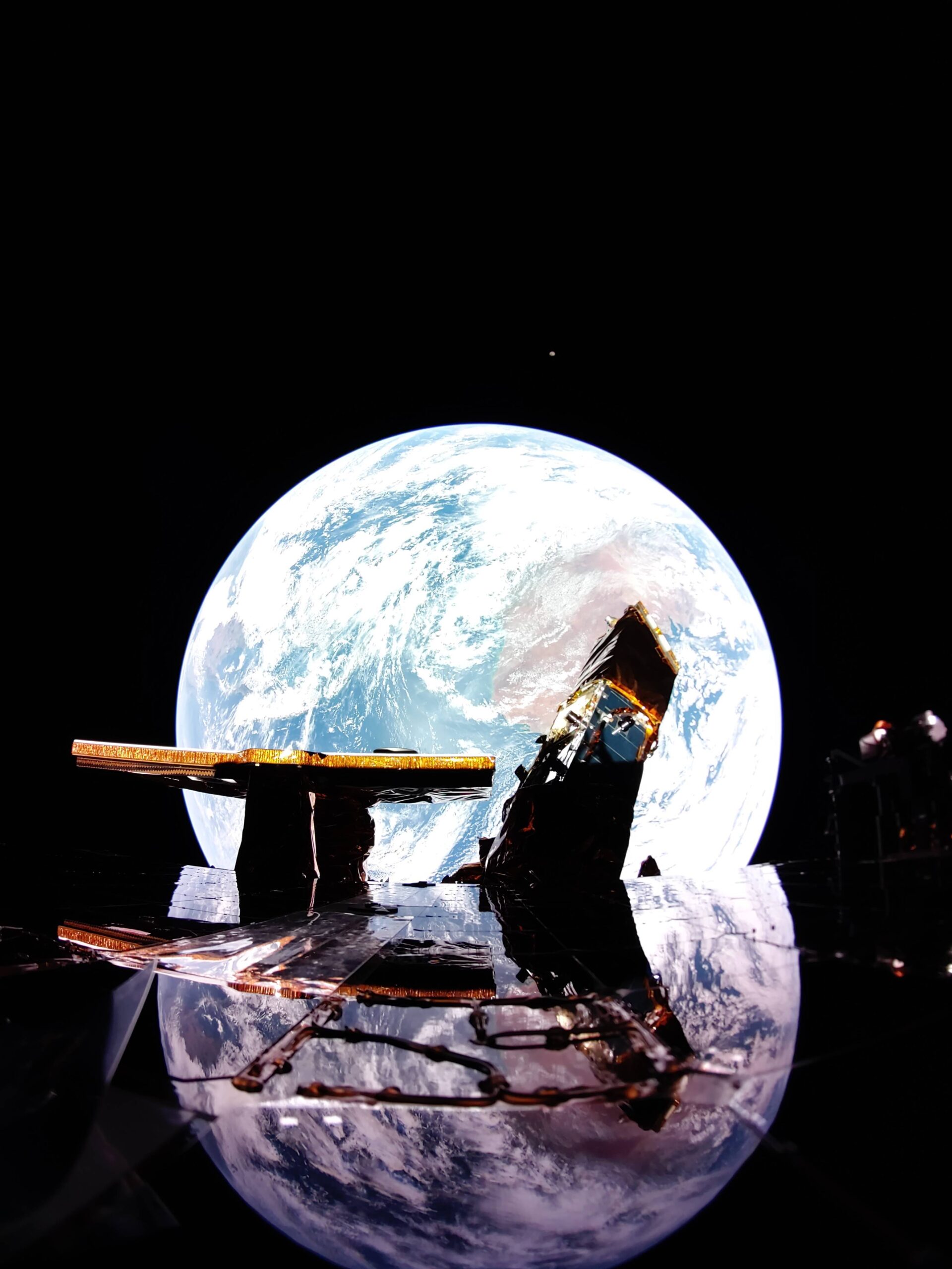 Earth-reflection-on-Blue-Ghost-scaled.jpg