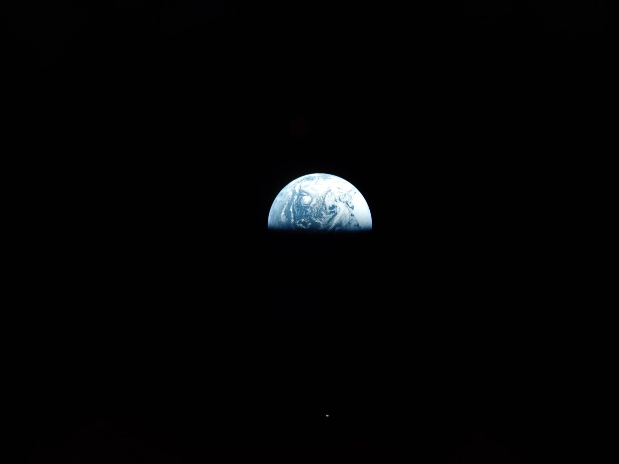 Earth-with-Moon-in-distance-2048x1536.jpg